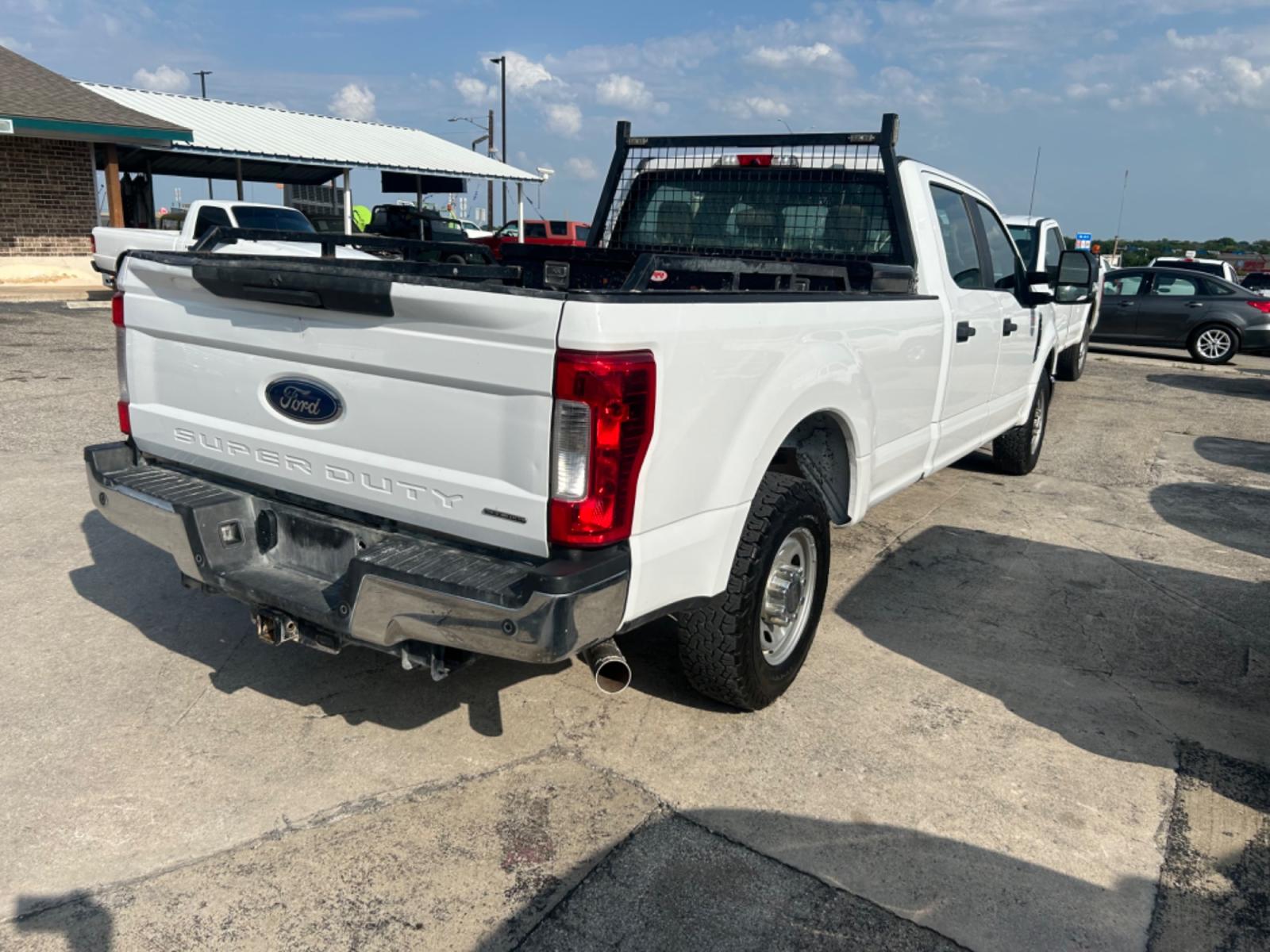 2019 White Ford F-250 SD Lariat Crew Cab Long Bed 2WD (1FT7W2A60KE) with an 6.2L V8 OHV 16V engine, 6A transmission, located at 1687 Business 35 S, New Braunfels, TX, 78130, (830) 625-7159, 29.655487, -98.051491 - Photo #2